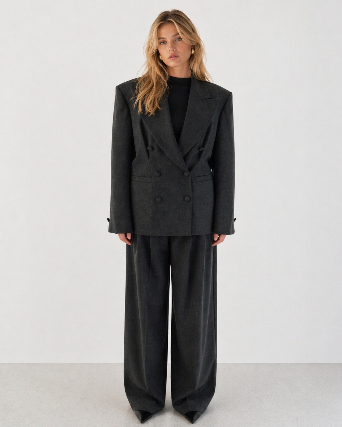 Double-breasted fitted blazer with subtle peplum silhouette