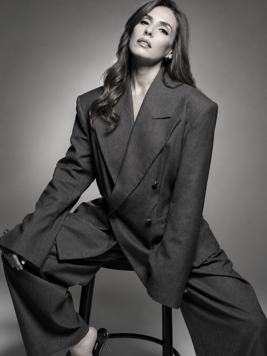 Double-breasted fitted blazer with subtle peplum silhouette